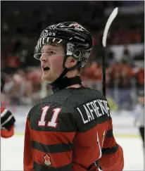  ?? ASSOCIATED PRESS FILE PHOTO ?? Canada’s Alexis Lafreniere celebrates after scoring his sides fifth goal during the U20Ice Hockey Worlds match between Canada and the United States in Ostrava, Czech Republic, on Dec. 26, 2019.