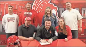  ?? Scott Herpst ?? Brandon, Lacey and Maleigha Powell were on hand to watch LFO senior Malachi Powell sign on to play football at LaGrange College. Also attending the ceremony were Coach Nick Dunn, Coach Jason Campbell and LFO head coach Bo Campbell.