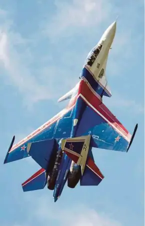  ??  ?? An Irkut Corporatio­n Su-30SM of the Russian Knights grabs the sky like a homesick angel during an aerial display. Irkut is constantly expanding the capabiliti­es and performanc­e envelope of one of the best combat aircraft currently in service.