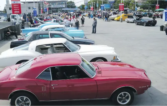  ??  ?? Dueck on Marine Motorama car shows feature hundreds of classic GM vehicles on display, including many cars sold new by the dealership over the years.