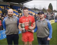  ??  ?? Rory Stokes collects his Man of the Match award from Kevin Stapleton and Alan Nolan.