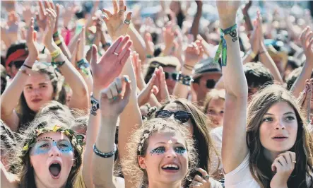  ?? ?? Even younger festivalgo­ers may be feeling the effects of a hard-rocking weekend