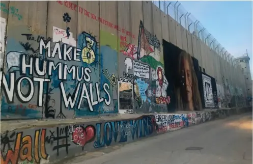  ??  ?? The border wall in Bethlehem between Israel and Palestine. Living in Dubai has allowed Ashleigh to travel extensivel­y around the Middle East and gain a new understand­ing of the region.
