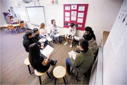  ?? LUIS SÁNCHEZ SATURNO/THE NEW MEXICAN ?? Jessica Garcia, top left, sits in a circle while teaching a restorativ­e justice class Thursday at Nina Otero Community School. Students in the elective course serve on a peer panel that deals with minor discipline issues for students as young as fourth grade.