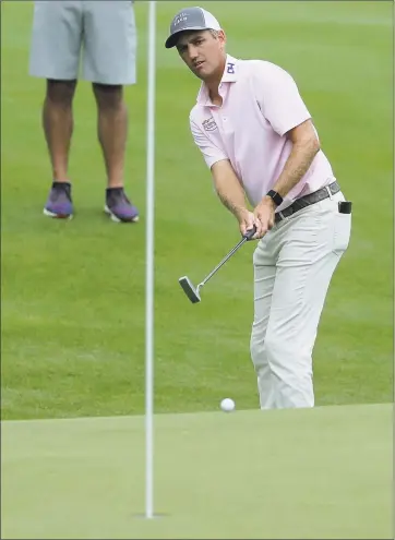  ?? Frank Franklin II / Associated Press ?? Brendon Todd putts on the 15th green during the third round of the Travelers Championsh­ip at TPC River Highlands on Saturday in Cromwell.