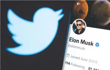  ?? (Illustrati­ve photo: Dado Ruvic/Reuters) ?? ELON MUSK’S Twitter account is seen on a smartphone in front of the Twitter logo.