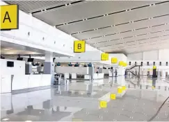  ??  ?? New Abuja airport terminal check-in counters