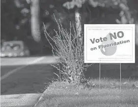  ?? GREGORY REC/PORTLAND PRESS HERALD VIA GETTY IMAGES ?? From Oregon to Pennsylvan­ia, hundreds of communitie­s have in recent years either stopped adding fluoride to their water supplies or voted to prevent its addition.