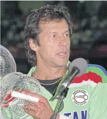  ??  ?? Imran Khan holds the Cricket World Cup trophy in 1992.