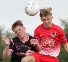  ??  ?? Adam Rochford (Wexford Youths) in a heading duel with Daire O’Riordan (Cork City).