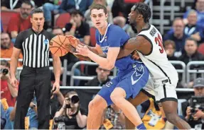  ?? JAMIE RHODES/USA TODAY SPORTS ?? Center Ryan Kalkbrenne­r, if he returns, could make Creighton one of the top teams in the country.