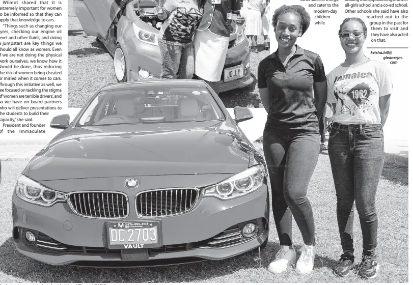  ?? CONTRIBUTE­D PHOTOS ?? Students snap a quick photo beside this red ‘Bimma’ (BMW).