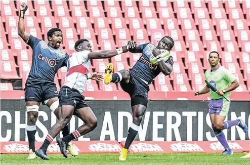  ?? Picture: Sydney Seshibedi/Gallo Images ?? Selengbe of the Lions and Yaw Penxe of the Sharks during the rugby match between at Ellis Park. The Lions won 43-40.