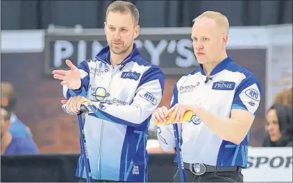  ?? GRAND SLAM OF CURLING FILE PHOTO/ANIL MUNGAL ?? Brad Gushue and Mark Nichols (right) are among many high-profile Canadian athletes who fully back the IOC’S decision to bar Russia’s Olympic team from the 2018 Winter Games.