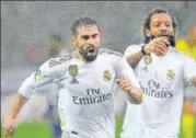  ?? AP ?? ■
Real Madrid's Dani Carvajal (left) celebrates scoring the winning goal against Alaves on Saturday.