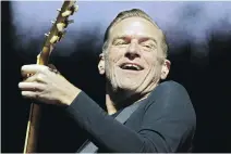  ??  JOHN MAHONEY/POSTMEDIA NEWS FILES ?? Bryan Adams takes to the stage Friday night celebratin­g the 30th anniversar­y of Reckless.