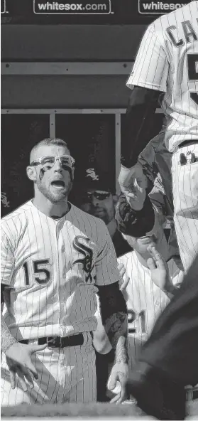  ?? | JON DURR/GETTY IMAGES ?? A pumped-up Brett Lawrie greets Melky Cabrera, who scored on a single by Dioner Navarro in the eighth inning Saturday at U.S. Cellular Field.