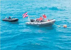 ?? PHOTO: AP ?? RECOVERY EFFORT: A rescue boat searches for missing passengers from a capsized tourist boat off Phuket, Thailand.