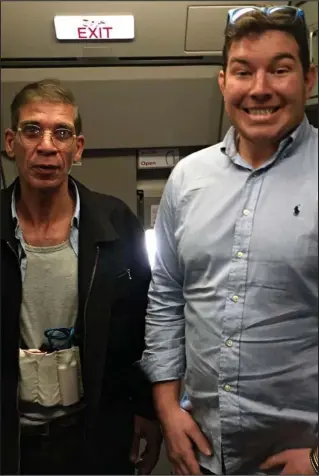  ??  ?? Shameless: Ben Innes, 26, with hijacker Seif Eldin Mustafa on the Boeing 737