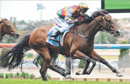  ?? Picture: VINCE CALIGIURI ?? Jessy Belle (Chris Symons) in full flight en route to victory at Moonee Valley yesterday