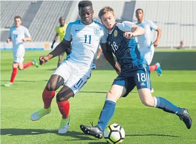  ?? Picture: SNS. ?? Craig Wighton in action for Scotland against England in last year’s Toulon Tournament.