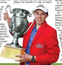  ?? GETTY IMAGES ?? Prize guy: Matt Fitzpatric­k shows off the spoils of victory