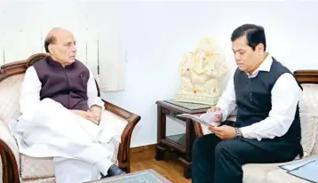  ??  ?? Assam Chief Minister Sarbananda Sonowal with Union Home Minister Rajnath Singh