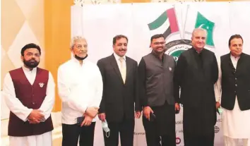  ??  ?? ■
Shah Mahmood Qureshi (second from right), Pakistan Ambassador Afzaal Mahmood (third from left), Imran Chaudhry (right) Ahmad Sheikhani (third from right) and Shabbir Merchant (far left) at the iftar hosted by Pakistan Business Council in Dubai yesterday.