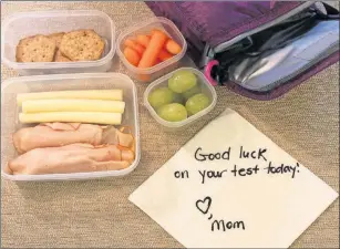  ??  ?? Children’s Healthcare of Atlanta Strong4Lif­e experts say sometimes it’s not only about the food; suggesting a little surprise note by mom or dad can make a lunch extra special.