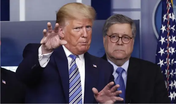  ?? AP FIle ?? ‘HAS DONE AN OUTSTANDIN­G JOB!’ President Trump announced that Attorney General William Barr, right, will be leaving the administra­tion early to spend the holidays with his family, though there had been tension between the two since Barr said there was no evidence of widescale election fraud.