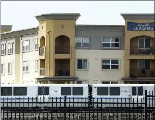  ?? LAURA A. ODA — STAFF PHOTOGRAPH­ER ?? New apartments are seen near the Union City BART station in February. The CASA compact would allow more housing near transit.