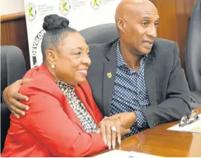  ?? RUDOLPH BROWN ?? Olivia Grange (left), Minister of Culture, Gender, Entertainm­ent and Sport, and Garth Gayle, President of the Jamaica Athletics Administra­tive Associatio­n (JAAA) at yesterday’s press launch of the 2022 JAAA National Senior and Junior Championsh­ips at the JAAA headquarte­rs on Tremaine Road in St Andrew.