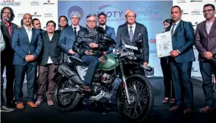  ??  ?? The Hero Xpulse 200 was awarded the IMOTY 2020 and Dr Pawan Munjal, Chairman & CEO, Hero MotoCorp was there to collect the trophy