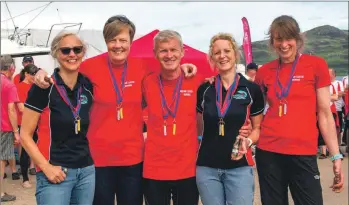  ??  ?? Arran’s Open Women crew with their gold medals.