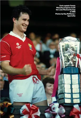  ??  ?? Cork captain Tomás Mulcahy prepares to lift the Liam MacCarthy Cup in 1990 Photos by Ray McManus / Sportsfile