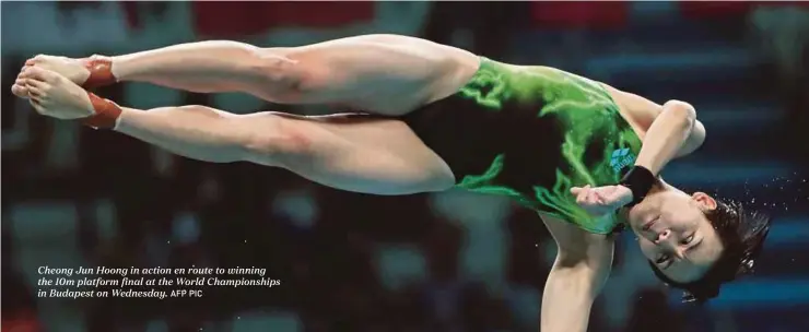  ?? AFP PIC ?? Cheong Jun Hoong in action en route to winning the 10m platform final at the World Championsh­ips in Budapest on Wednesday.