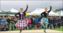  ??  ?? Aimee Sneddon, 16, and Lindsey Jones, 35, compete in the adult Highland dancing competitio­ns. Lindsey won the Robert Cuthbertso­n shield for the category. 21_ F32 Arisaig Games_ highland dancing 01