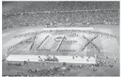  ?? BRAD HORRIGAN/HARTFORD COURANT ?? Marjory Stoneman Douglast student Alex Schachter’s dream was to play in the UConn marching band, which honored him at halftime on Thursday.