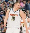  ?? David Zalubowski/Associated Press ?? Nuggets center Nikola Jokic in the second half on Sunday in Denver.