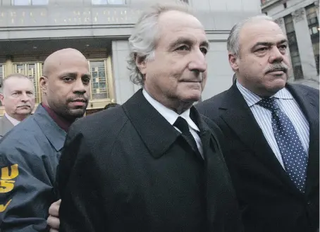  ?? HIROKO MASUIKE/GETTY IMAGES FILES ?? Bernard Madoff, seen in 2009 in New York City, was sentenced to 150 years in prison for bilking investors out of billions in his Ponzi scheme. Trustee Irving Picard said Monday more than half of Madoff’s customers will have recovered their lost...