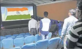  ?? PHOTO: ARUN MONDHE / HT ?? A file photo of people standing for the National Anthem before a film show