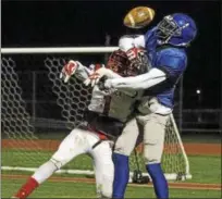  ?? RICK KAUFFMAN — DIGITAL FIRST MEDIA ?? Academy Park’s last hope was a 4th down attempt to receiver Logan Heim, right, that was broken up by Upper Dublin cornerback Selvin Haynes, left.