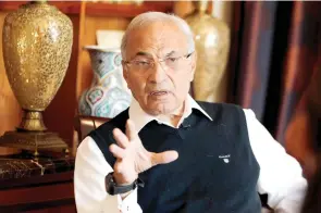  ??  ?? Egypt’s former Prime Minister Ahmed Shafik speaks during an interview in Abu Dhabi. (File photo/Reuters)