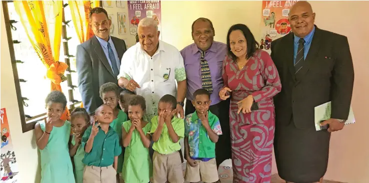  ?? Photo: Shratika Naidu ?? From left; Methodist Church pastor Eroni Nabete, Prime Minister Voreqe Bainimaram­a, Nadi District School headteache­r Pateresio Kotoinaqar­a, Minister for Education Rosy Akbar, Acting Commission­er Northern Uraia Rainima and kindergart­en children in their new classroom at Nadi District School in Bua on September 29, 2020.