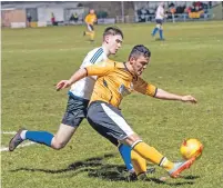  ?? Photo: Abrightsid­e Photograph­y. ?? Fort player Barna Tot is put under pressure from Nairn’s high press.