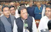  ?? REUTERS FILE ?? ■ Imran Khan (centre) speaks at the National Assembly.