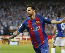  ??  ?? MADRID: In this Saturday May 27, 2017 file photo, Barcelona’s Lionel Messi celebrates after scoring a goal during the Copa del Rey final soccer match between Barcelona and Alaves at the Vicente Calderon stadium in Madrid, Spain. Barcelona said...