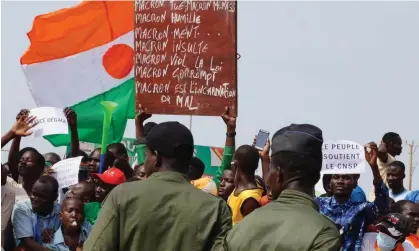  ?? Photograph: Anadolu Agency/Getty ?? Supporters of Niger’s junta protest against France’s military presence in the country in August. Images