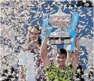  ?? Picture: NACHO DOCE/REUTERS ?? CLASS ACT: Spain’s Carlos Alcaraz celebrates with the trophy after winning the Barcelona Open final against Greece’s Stefanos Tsitsipas yesterday