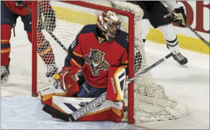  ?? THE ASSOCIATED PRESS — FILE PHOTO ?? Mike McKenna, seen here with the Florida Panthers during one of his 22NHL contests, is one of the most decorated goaltender­s in the history of the AHL.